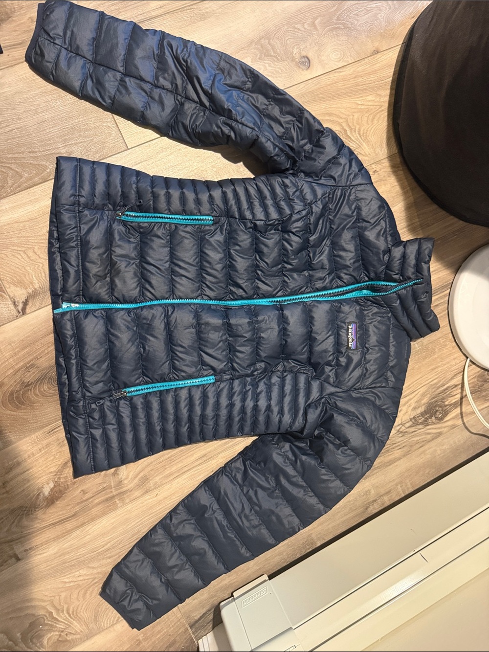Patagonia Navy Puffer Jacket with Blue-Turquoise Zippers